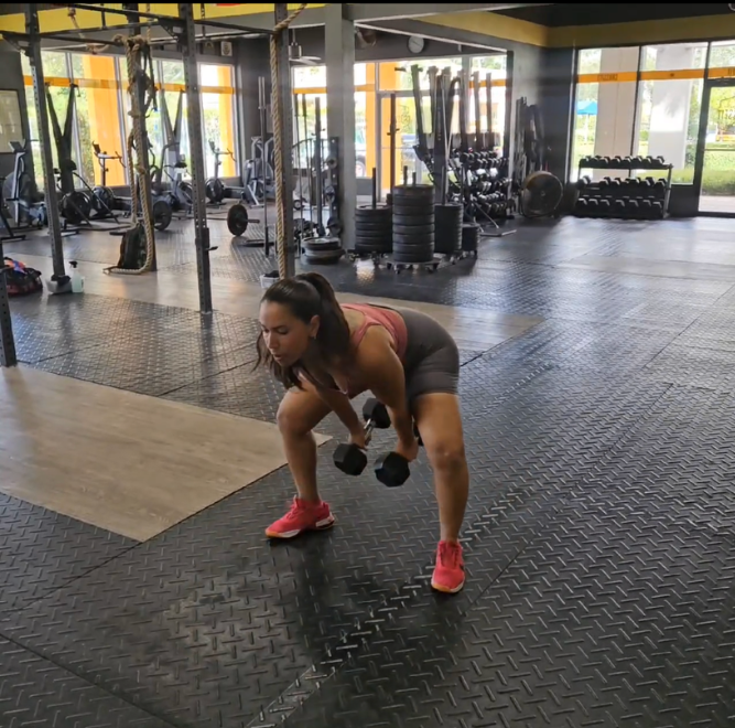 Woman lifting dumbbells - What is a Devil Press in CrossFit? CrossFit LPF in Coconut Creek, FL
