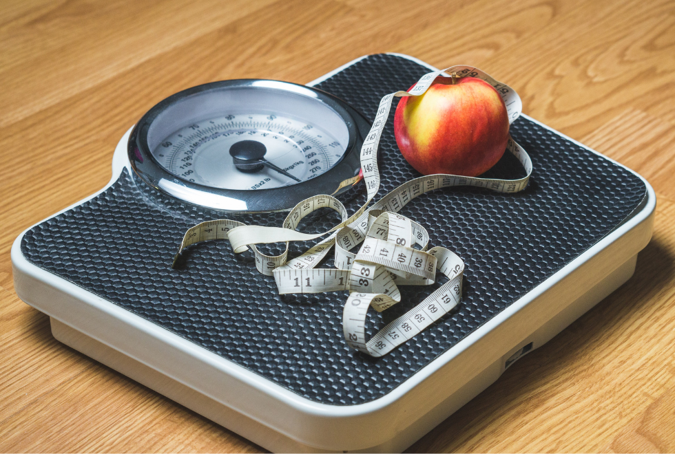 Scale, Measuring Tape, and Apple- Is CrossFit Good for Weight Loss? - CrossFit LPF in Coconut Creek, FL